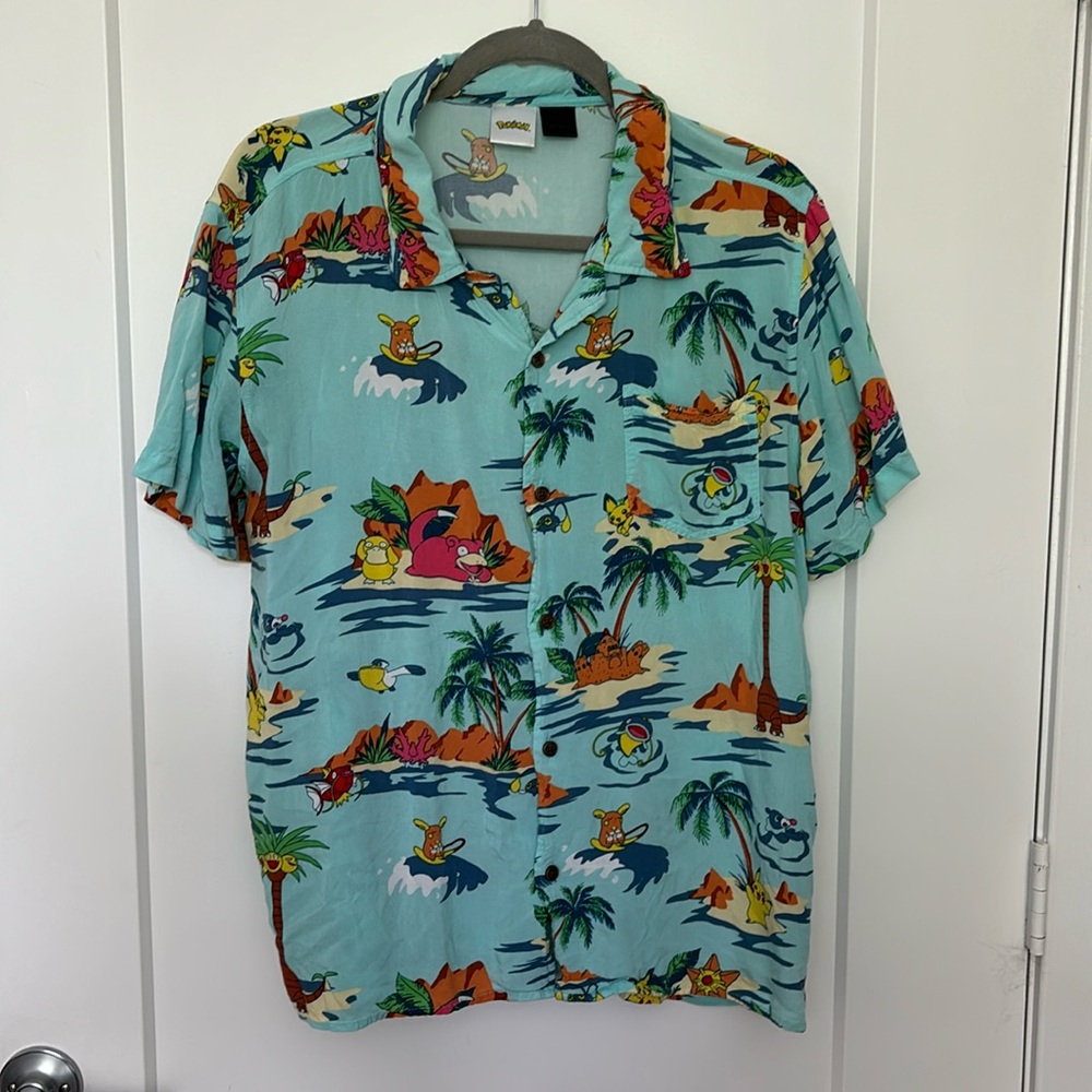 Pokémon men’s button-down top, size medium with front pocket and all overprint